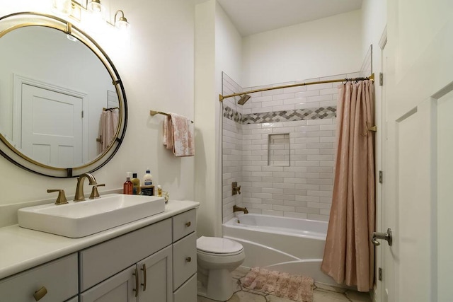 full bathroom with vanity, toilet, and shower / bath combo