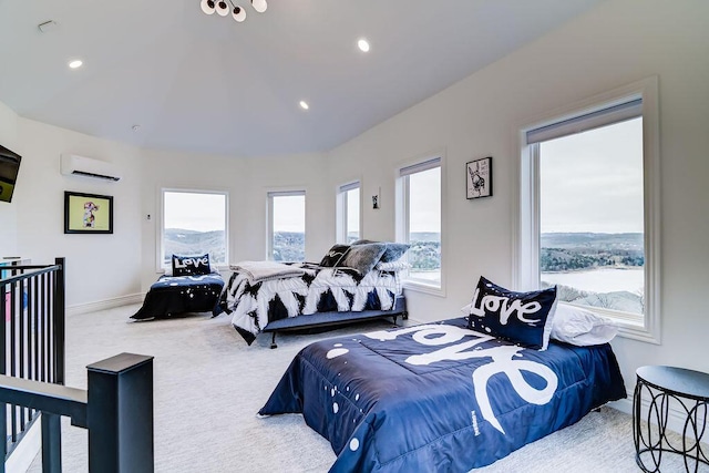 carpeted bedroom featuring lofted ceiling and a wall mounted air conditioner