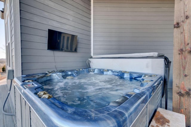 exterior space featuring a hot tub