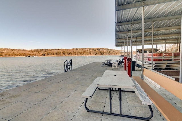 view of dock with a water view