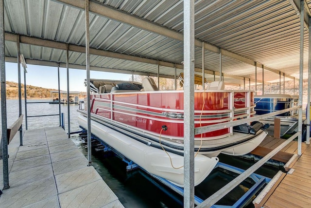 dock area featuring a water view