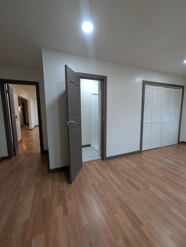 unfurnished bedroom with light hardwood / wood-style floors