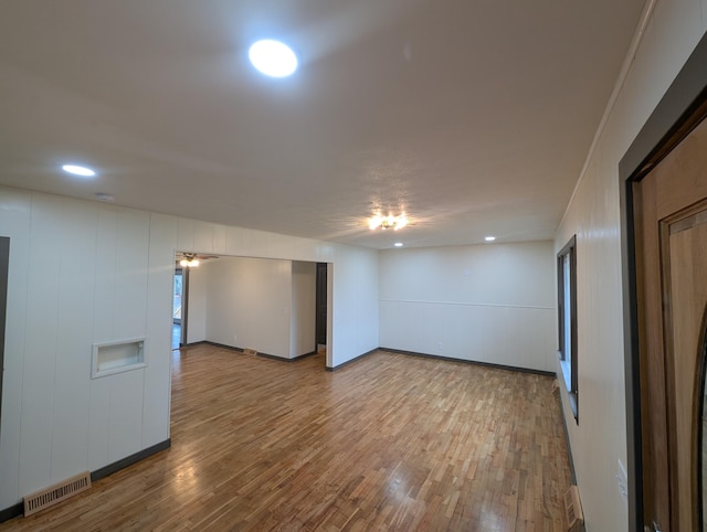 unfurnished room featuring hardwood / wood-style flooring