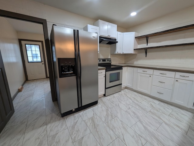 kitchen with backsplash, appliances with stainless steel finishes, and white cabinets