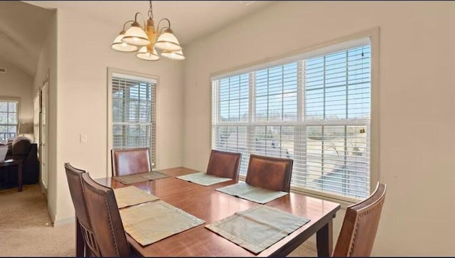 dining room with a chandelier