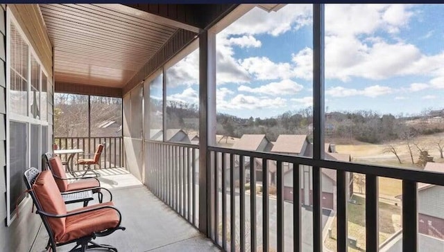 sunroom / solarium with a healthy amount of sunlight