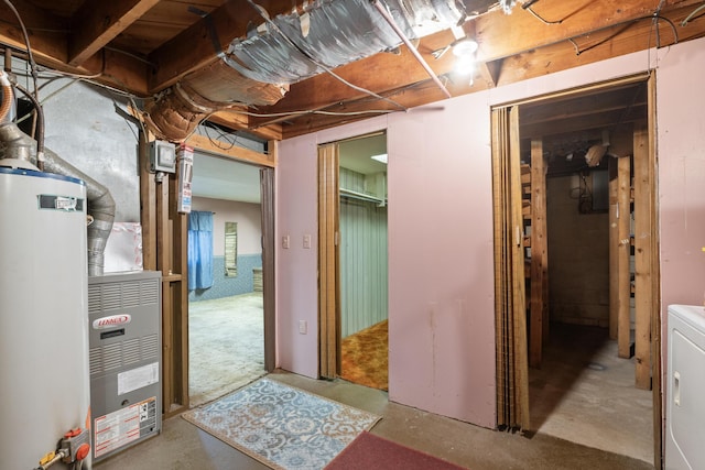 basement featuring washer / dryer and gas water heater