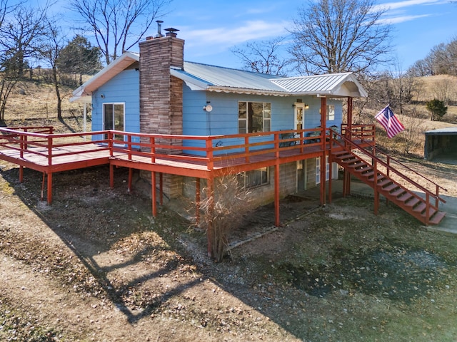 view of playground featuring a wooden deck