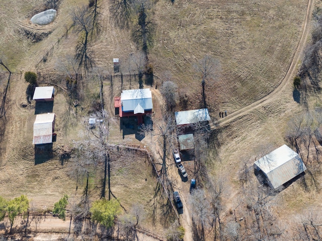 birds eye view of property featuring a rural view