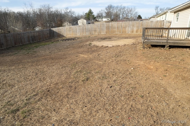 view of yard with a deck