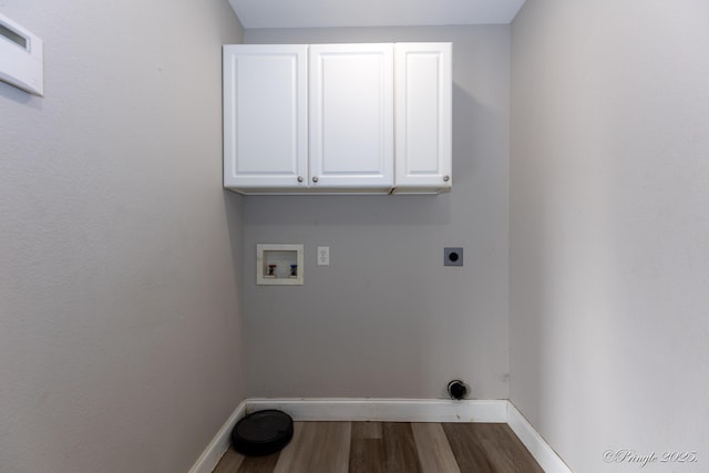 washroom featuring cabinets, hardwood / wood-style floors, electric dryer hookup, and washer hookup