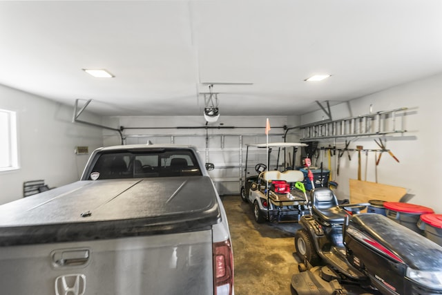 garage featuring a garage door opener