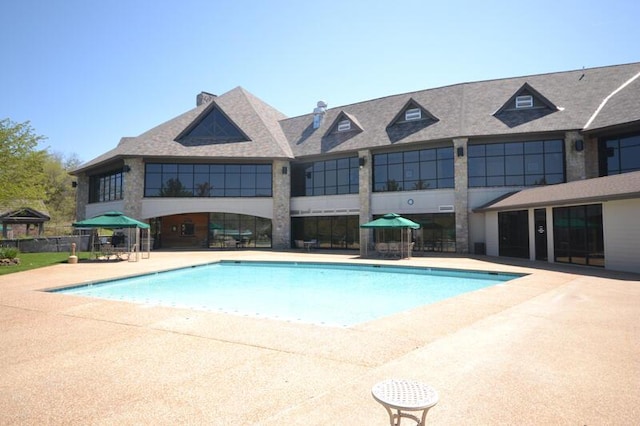 view of pool with a patio and a fenced in pool