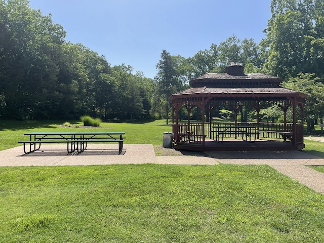 view of community featuring a yard and a gazebo