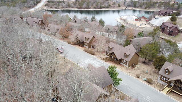 aerial view with a water view and a residential view