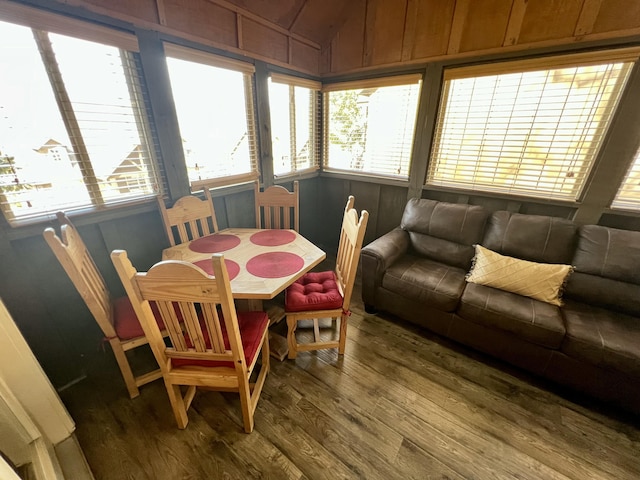 dining space featuring wood finished floors