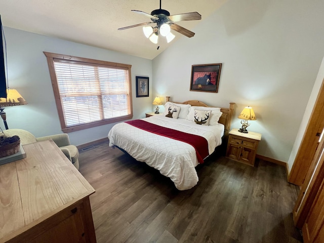 bedroom with visible vents, dark wood-type flooring, a ceiling fan, vaulted ceiling, and baseboards