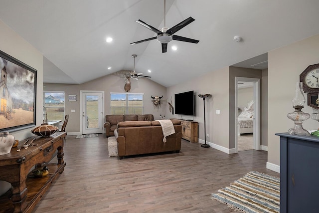 living room with wood-type flooring, lofted ceiling, and ceiling fan