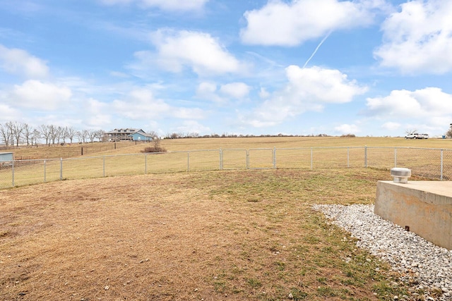 view of yard with a rural view