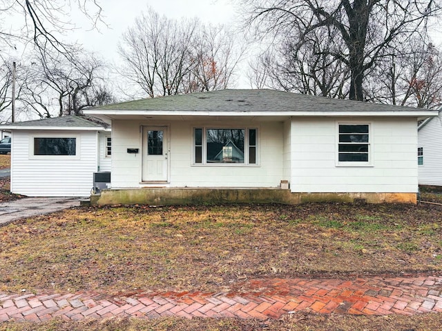 ranch-style house featuring central air condition unit