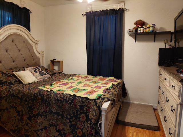 bedroom featuring light wood-type flooring