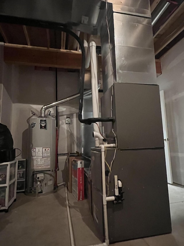 utility room with gas water heater