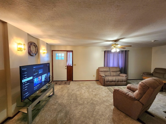 living room featuring carpet flooring and a textured ceiling