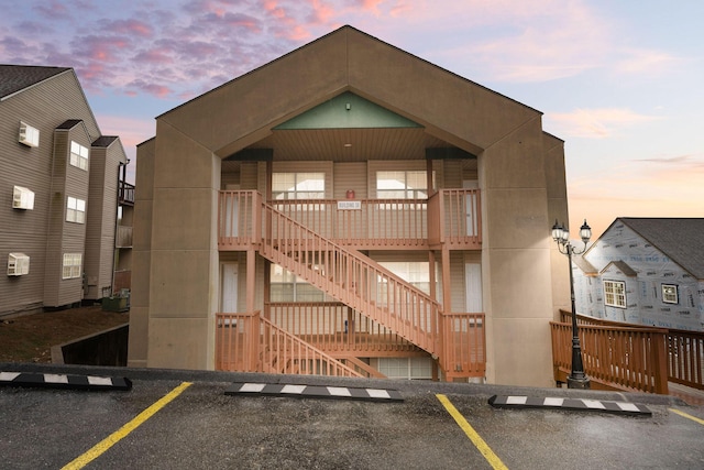 view of outdoor building at dusk