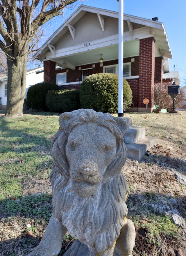 view of front of home with brick siding