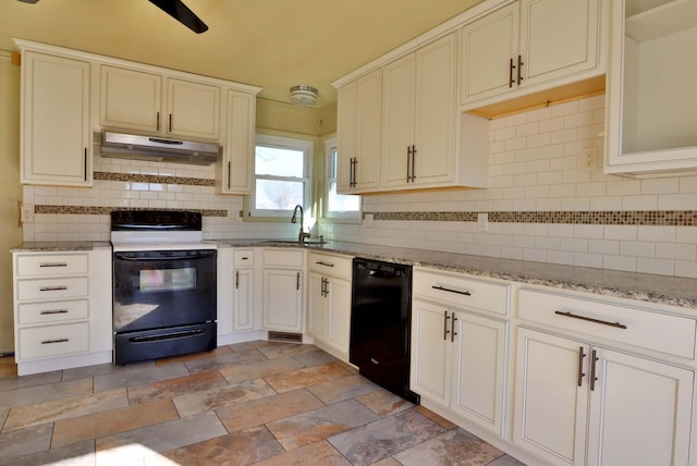 kitchen featuring under cabinet range hood, range with electric cooktop, a sink, black dishwasher, and decorative backsplash