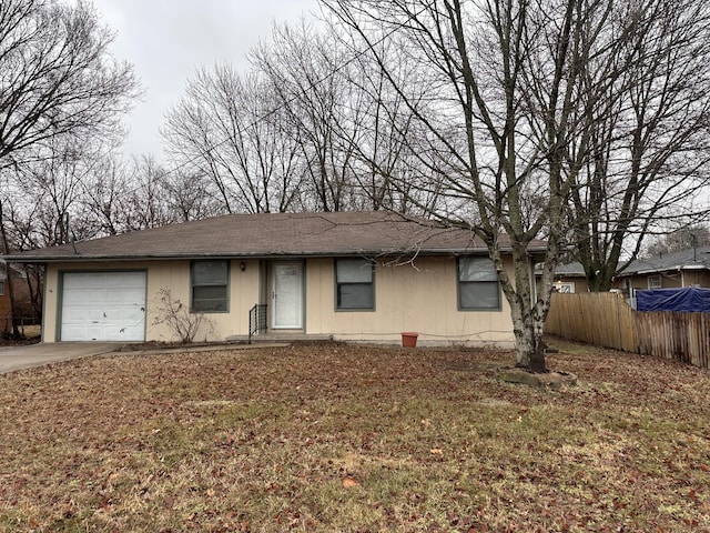 single story home featuring a garage