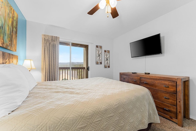 bedroom featuring access to exterior, carpet floors, ceiling fan, and vaulted ceiling