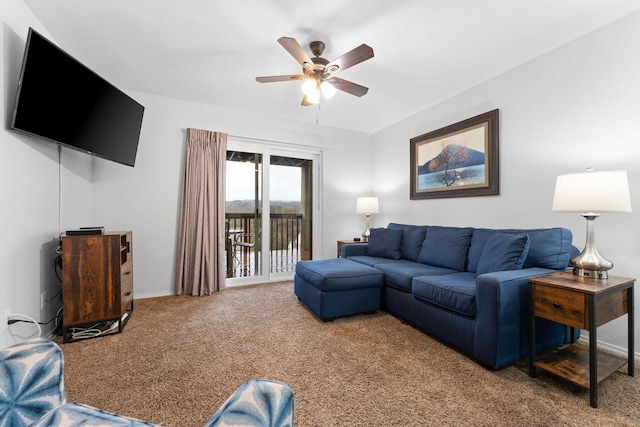 carpeted living room featuring ceiling fan