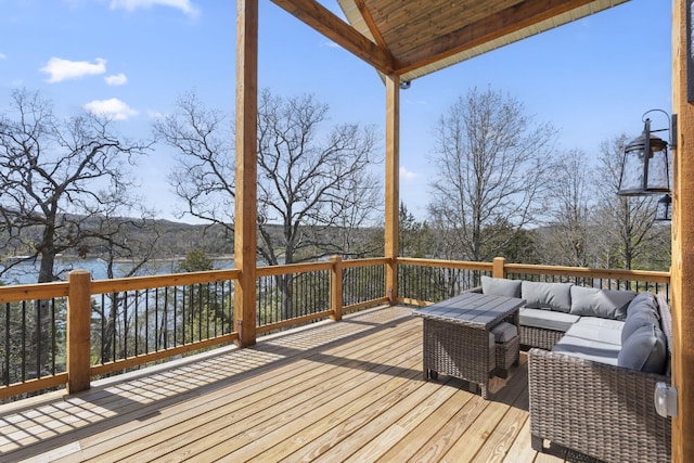 wooden deck featuring outdoor lounge area