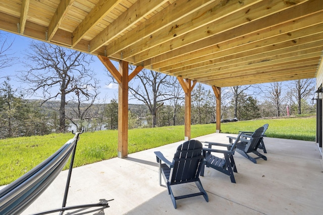 view of patio / terrace with a water view