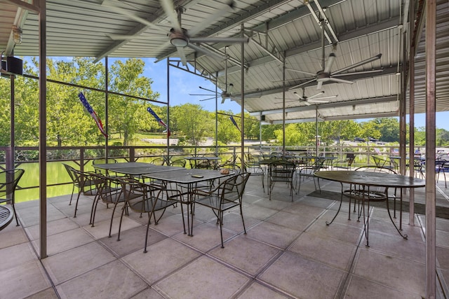 view of patio featuring ceiling fan