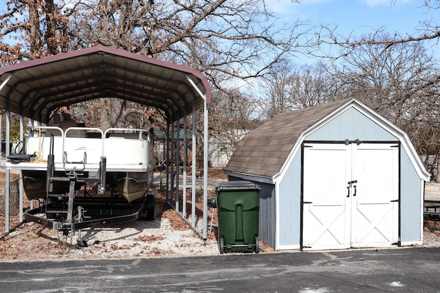 view of outbuilding with a carport