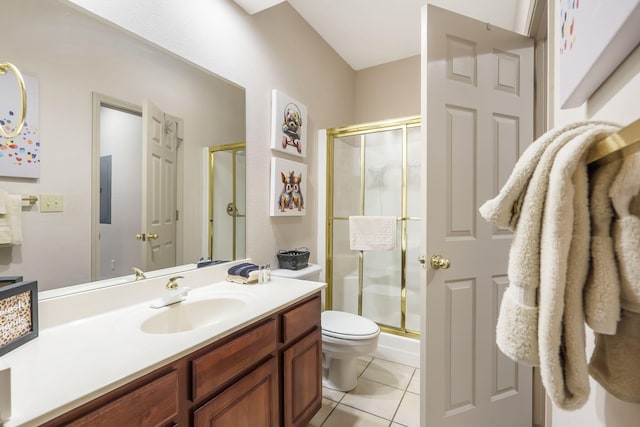 bathroom with vanity, an enclosed shower, tile patterned floors, and toilet