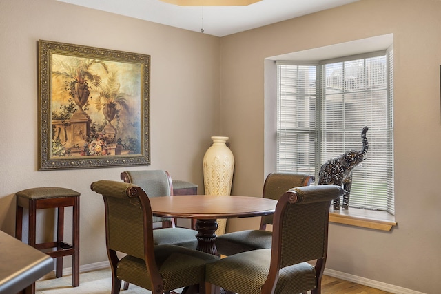 dining space featuring a healthy amount of sunlight