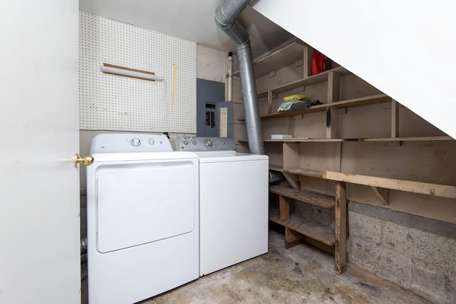 laundry room with separate washer and dryer and electric panel