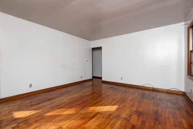 unfurnished room featuring hardwood / wood-style floors