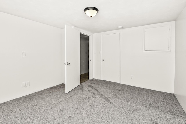 unfurnished bedroom featuring carpet