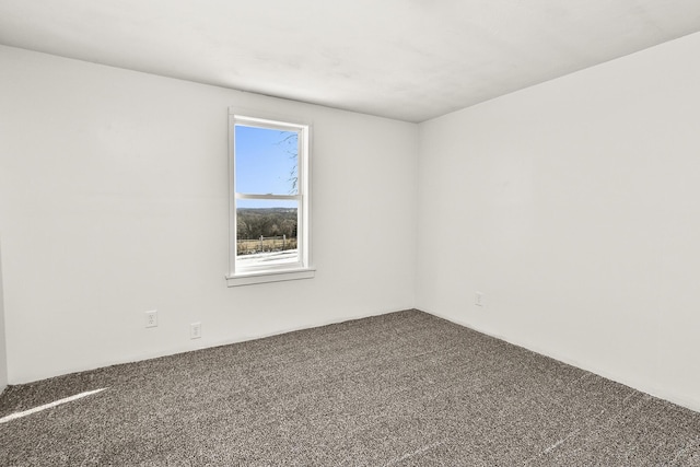 unfurnished room featuring carpet floors