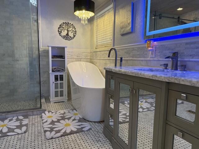 bathroom with vanity, separate shower and tub, tile patterned floors, and a chandelier