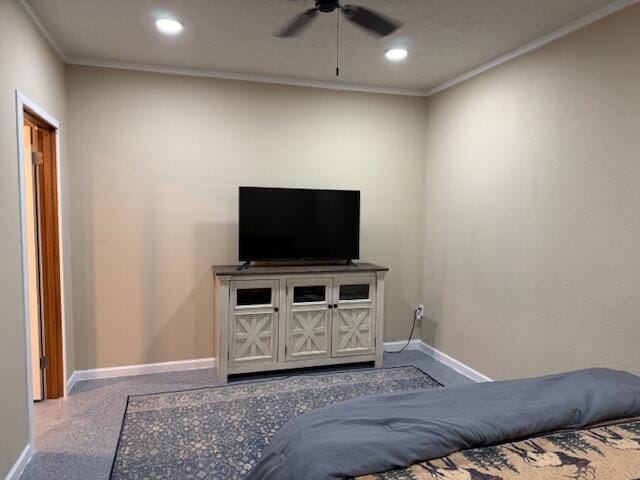 bedroom with ornamental molding and ceiling fan