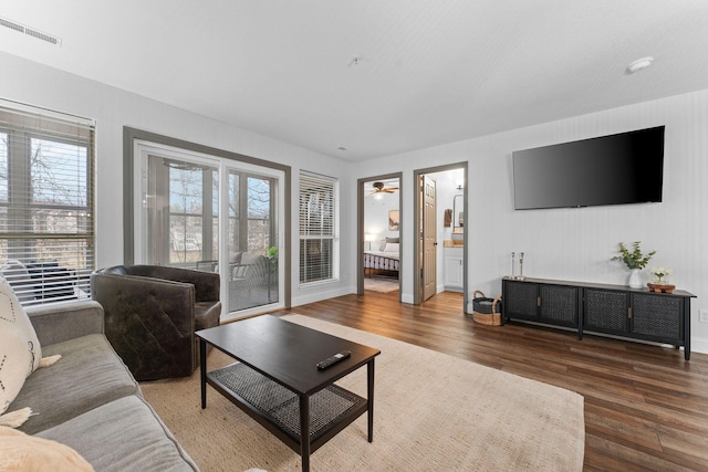 living room featuring dark hardwood / wood-style floors