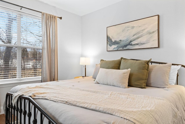 bedroom featuring multiple windows