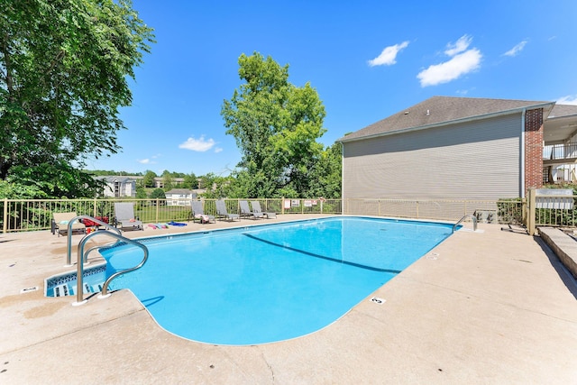 view of pool featuring a patio