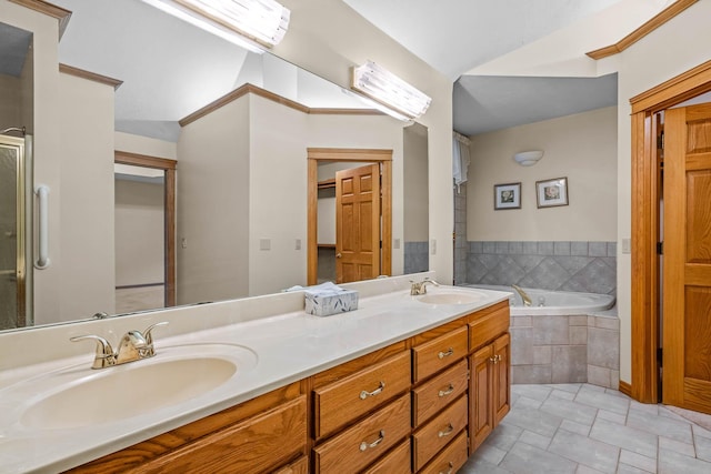 bathroom featuring vanity and shower with separate bathtub