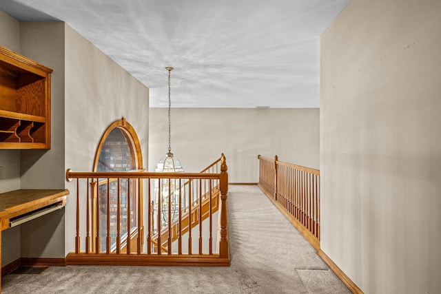 hallway featuring carpet floors